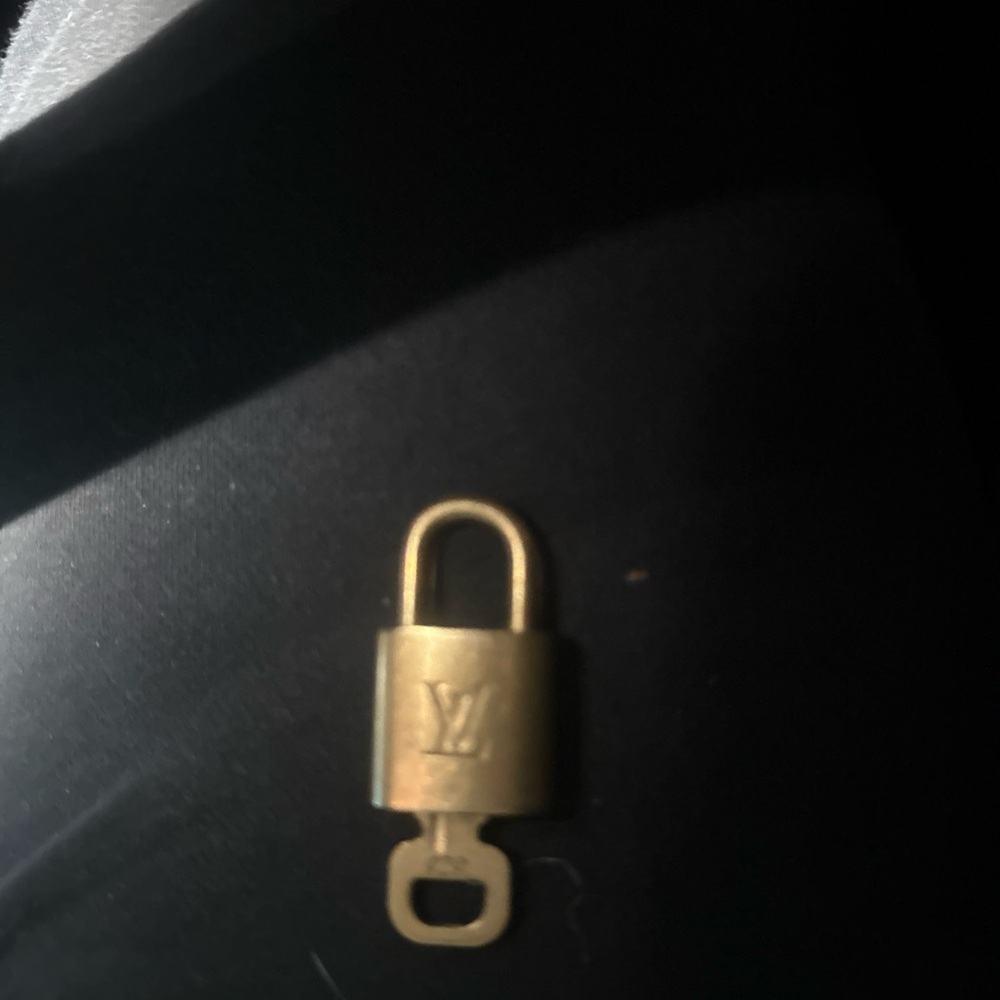 Louis Vuitton Luxurious Gold Lock and key